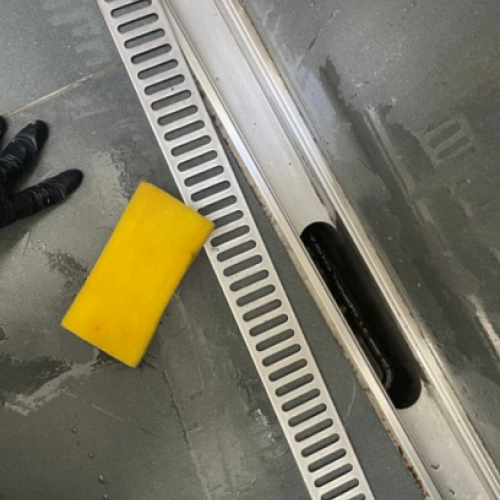 Ren aflang rist til afløb, efter privat rengøring i Slagelse.