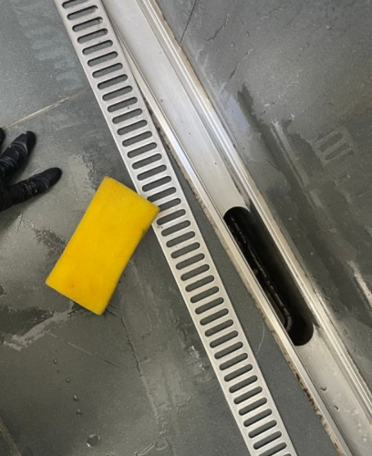 Ren aflang rist til afløb, efter privat rengøring i Slagelse.